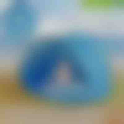 Un cort pentru copii cu protecție UV și o piscină | BAYSHADE